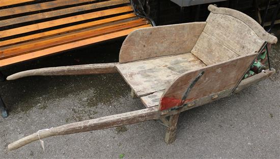 Wooden wheel barrow(-)